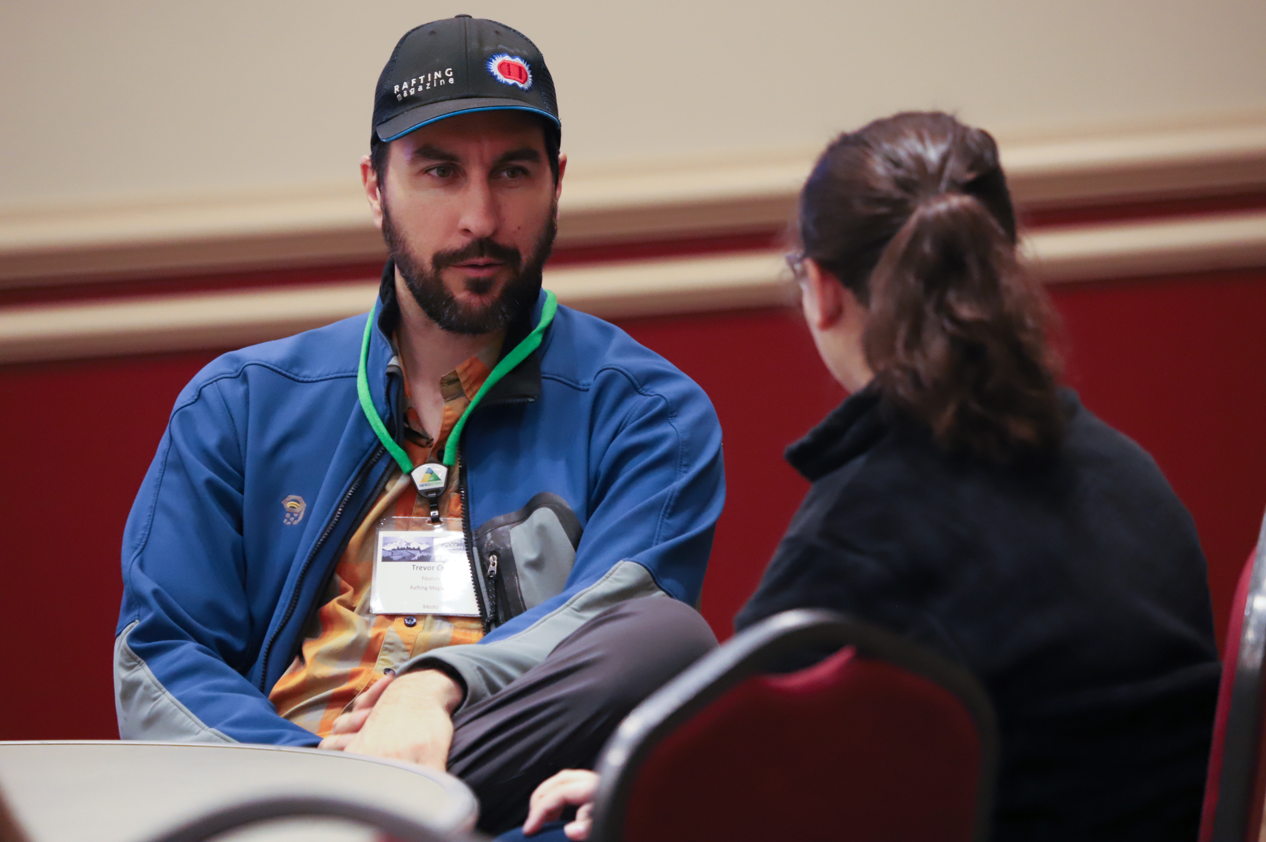 Editor of Rafting Magazine Talks to Participant at America Outdoors Conference