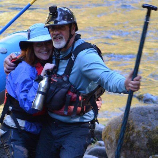 Bill and Sharon Blodgett, smiling by the river