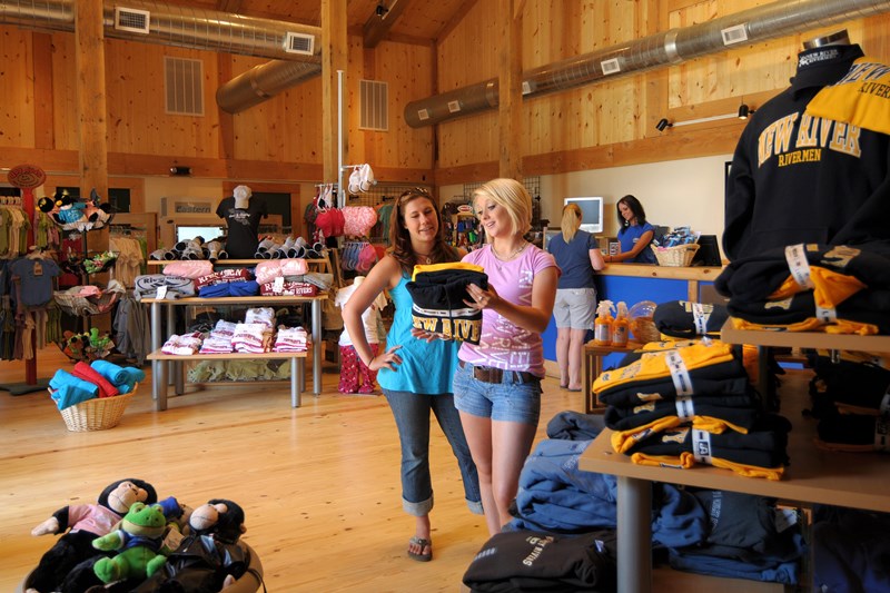 Two women view clothing items in Adventures on the Gorge Retail Store
