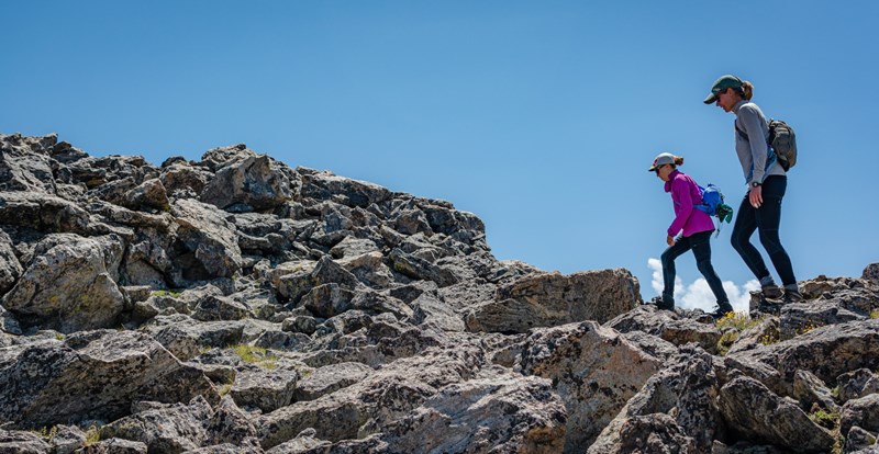 Hikers on a ridge line- photo by Daniel Lay