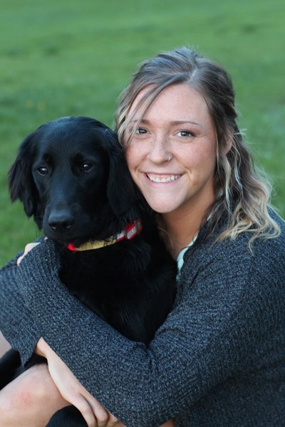 Liz Kratz poses with cute dog