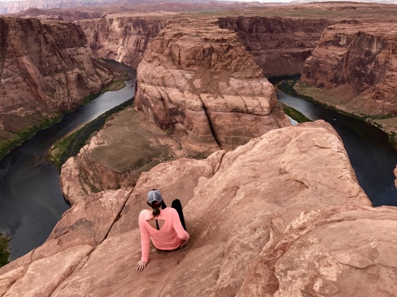 Liz Kratz sits and takes in view at horseshoe bend