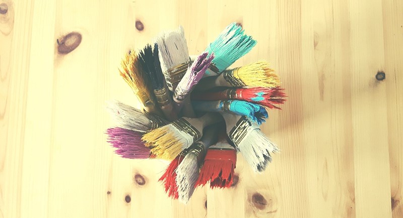 Paint brushes with all colors of the rainbow