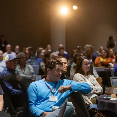 outdoor professionals listening to a workshop at an america outdoors conference